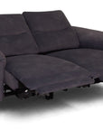 A dark gray reclining loveseat sofa with the seat cushion extended, shown on a plain white background.